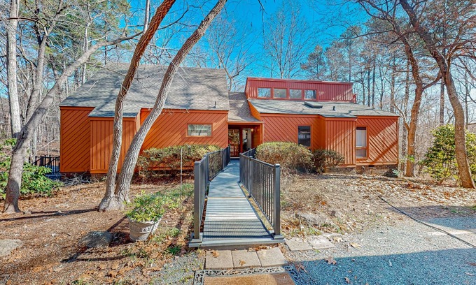 Durham House | Woodland acreage with 60' deck on gurgling brook, pizza oven, rec area & library