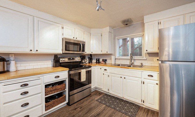 Copalis Beach House | Woodland home with hot tub & fireplace - around the corner from beach path