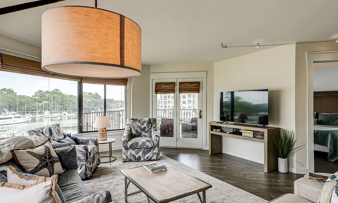 Shelter Cove Villa | Yacht Club Villas | Updated corner condo with marina view, shared pool & hot tub