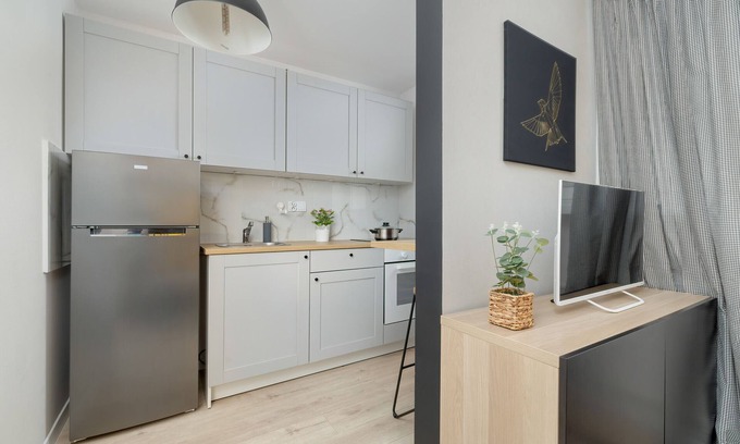 Brynow Apartment | Yellow and Grey Studio by Renters