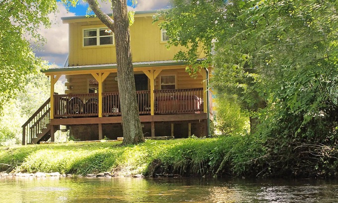 Newport Cabin | Yellow Cabin on the River by RedAwning
