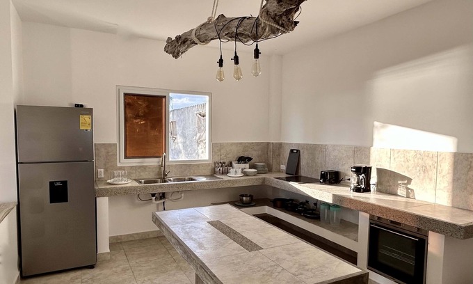 Puerto Villamil House | Yellow Heron house