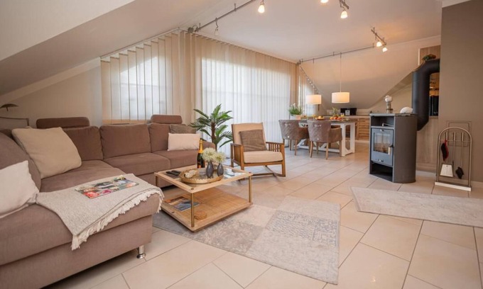 Zingst Apartment | Zum Kranich, exclusive 4-star-plus vacation apartment with fireplace for 4 people in Zingst
