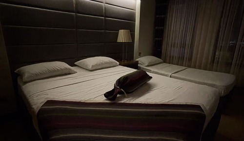 Basic Room, Multiple Beds, Smoking, Partial Sea View