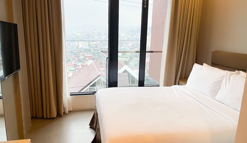 Basic Quadruple Room, 2 Queen Beds, Balcony, City View