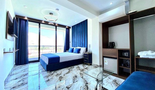 Suite con jacuzzi vista al jardin