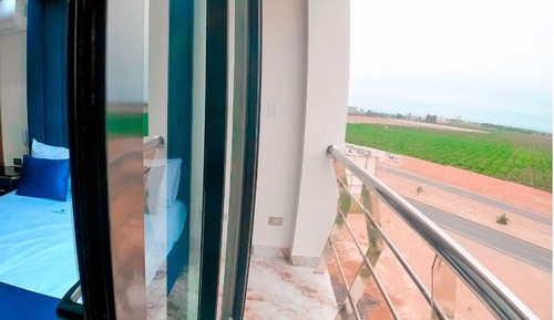 Suite con jacuzzi y balcón