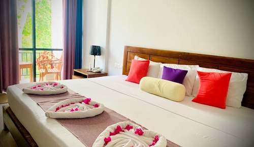 Elite Triple Room, Balcony, Garden View