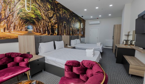 Deluxe Quadruple Room, 2 Queen Beds