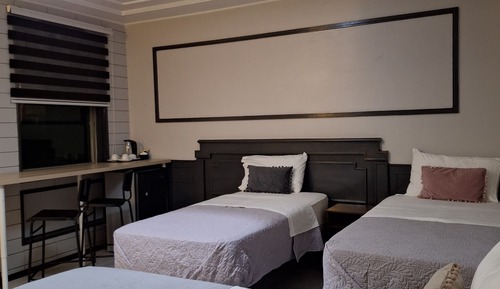 Grand Triple Room