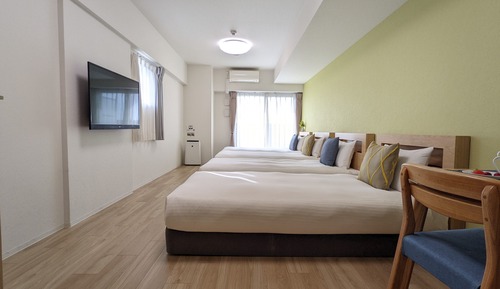 Deluxe Quadruple Room, Multiple Beds, Non Smoking, City View