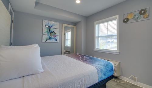 One Queen Bed with Disability Access