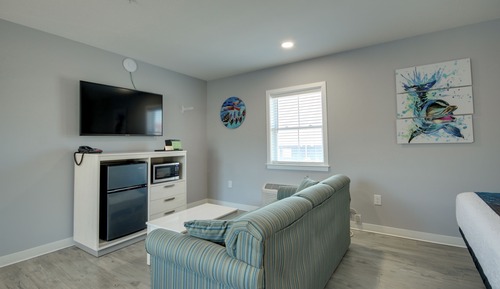 Two Queen Beds with Queen Sofa Bed