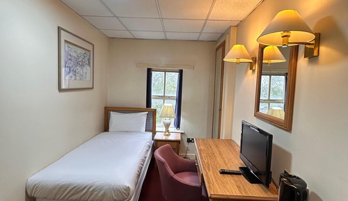 Basic Single Room, 1 Twin Bed, Non Smoking, Shared Bathroom