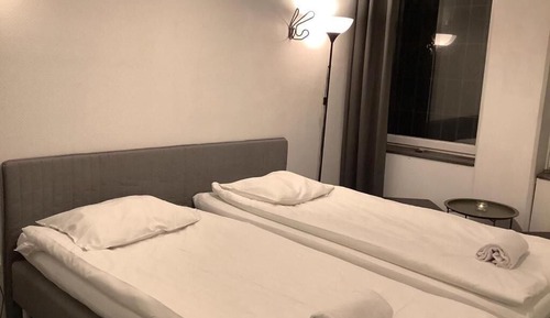 Private twin room, shared amenities
