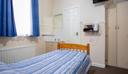 Basic Single Room, 1 Twin Bed, Non Smoking, Shared Bathroom