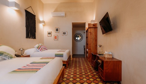 Deluxe Family Room with Balcony, Air Conditioning and Private Bathroom