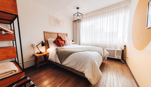 Compact Room with Shared Bathroom