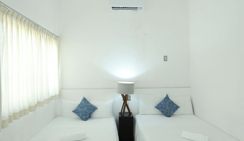 Comfort Room, Patio two double beds