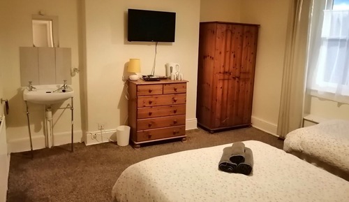 Family Room, Shared Bathroom (Room 2)