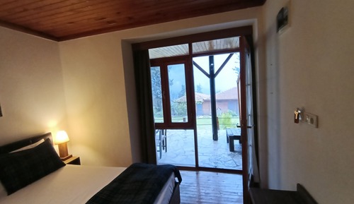 Economy Quadruple Room, Patio, Garden View
