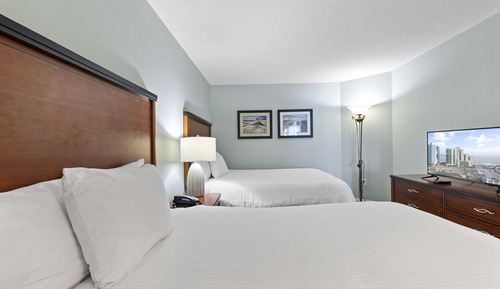One Bedroom Deluxe Suite- 2 Queen Beds, Oceanfront, Private Balcony, Full Kitchen