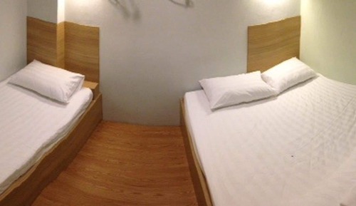 Triple Bed with Shared Bathroom