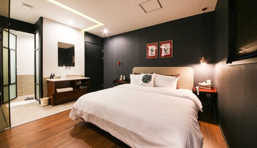 B. Deluxe Styler Room - Fri/Sat Check-in Time: 8PM