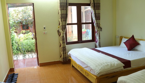 Deluxe Quadruple Room, 1 Bedroom, Garden View, Courtyard Area