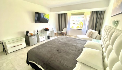 Signature Quadruple Room