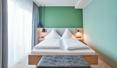 Komfort-Doppel- oder -Zweibettzimmer