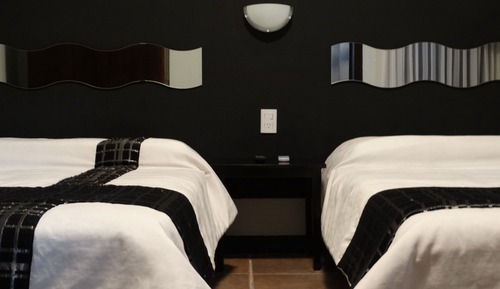 Deluxe Quadruple Room, 2 Queen Beds