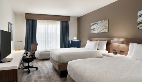 Evolution two queen bed room