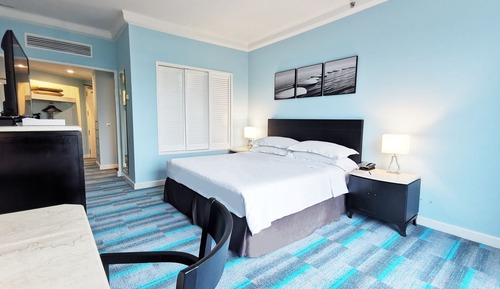 Family Suite 1 King Bed & 1 Single Extra Bed only (2 Adult +2 Children)