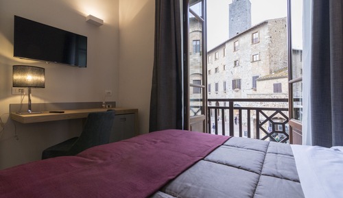 double room square view with balcony