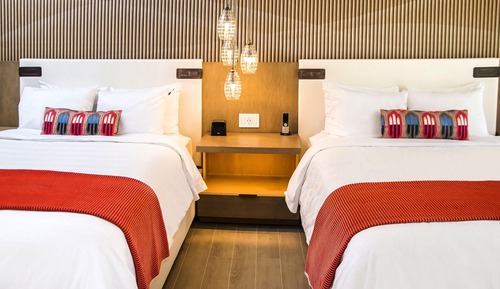 Deluxe Gold Two Queen Beds