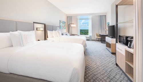Suite, 2 Queen Beds with Sofa Bed, Inland View (Mobility/Hearing Accessible, Tub)