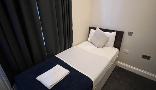 Single Room, Shared Bathroom