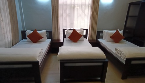 Deluxe Triple Room, Balcony, Garden View