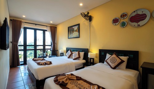 Deluxe Triple Room, Multiple Beds, Balcony, Courtyard View