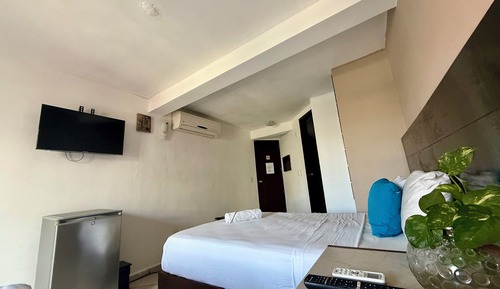 Deluxe Suite, 2 Queen Beds, Balcony, City View