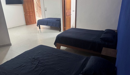 Deluxe Triple Room, Multiple Beds, Private Bathroom, Pool View