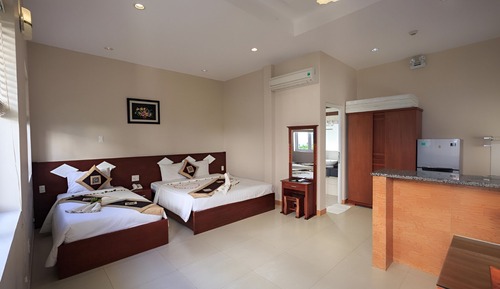 Deluxe Triple Room, Balcony, Garden View