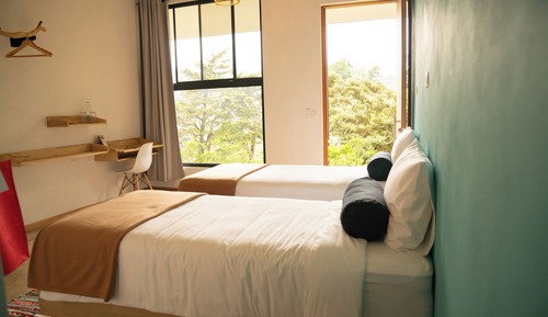 Deluxe Triple Room, Patio, City View