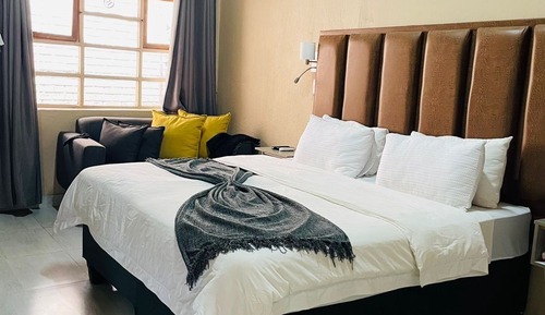 Deluxe Triple Room, Patio, Garden View