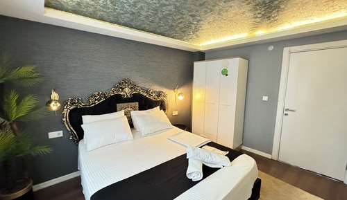 Deluxe Quadruple Room, City View