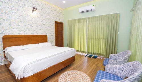 Deluxe Suite, Balcony, Garden View