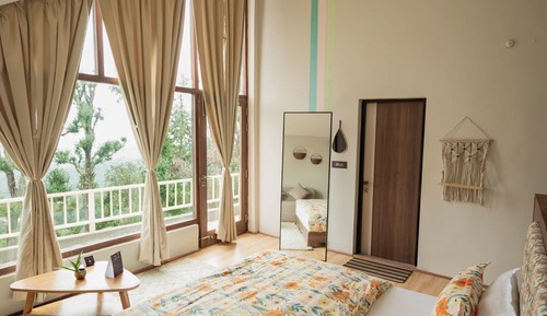 Dhara (Studio Room with Work Station and A/c)