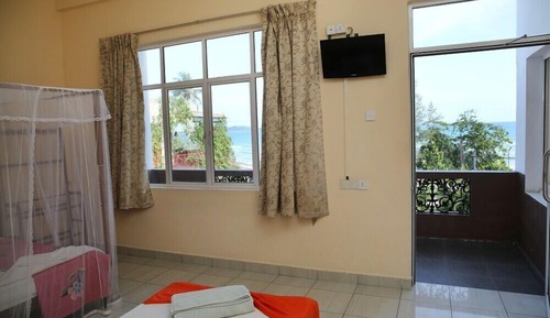 Deluxe Triple Room, Balcony, Beach View