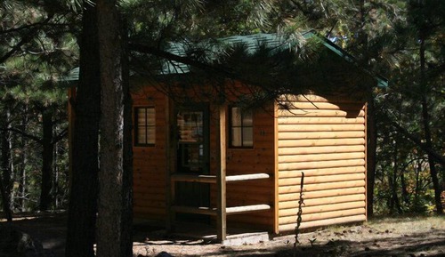 Economy Cabin, 2 Twin Beds, Refrigerator & Microwave (no bathroom in cabin, community bathroom)